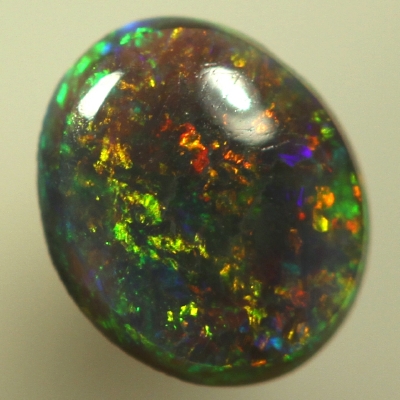SOLID SEMI BLACK OPAL Pinfire pattern. Sparkling bright fire.